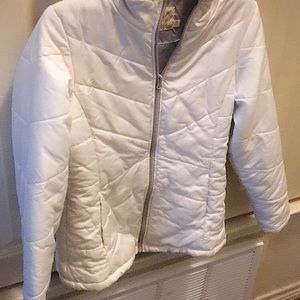 White & inside grey coat.